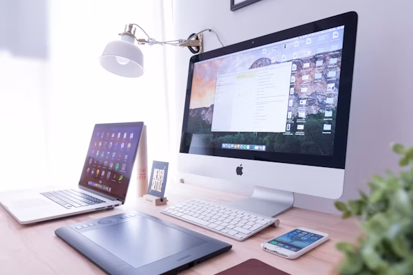 Content creator writing blog articles on a laptop